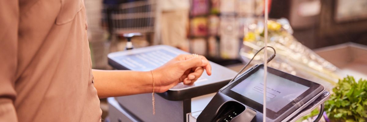 Person cashing out at teller