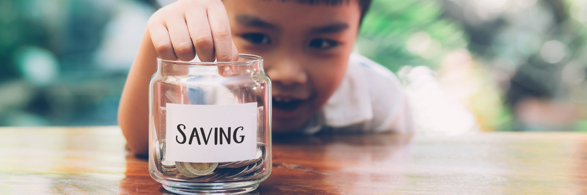 Child saves money for his youth savings account